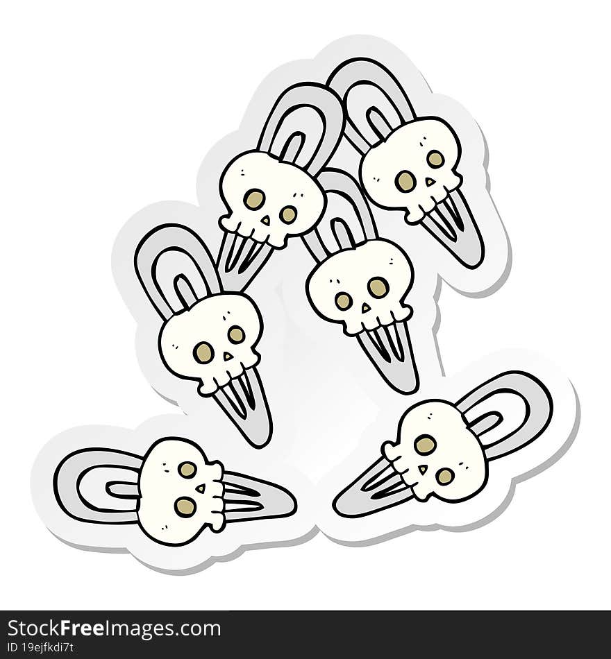 sticker of a cartoon skull hairclips