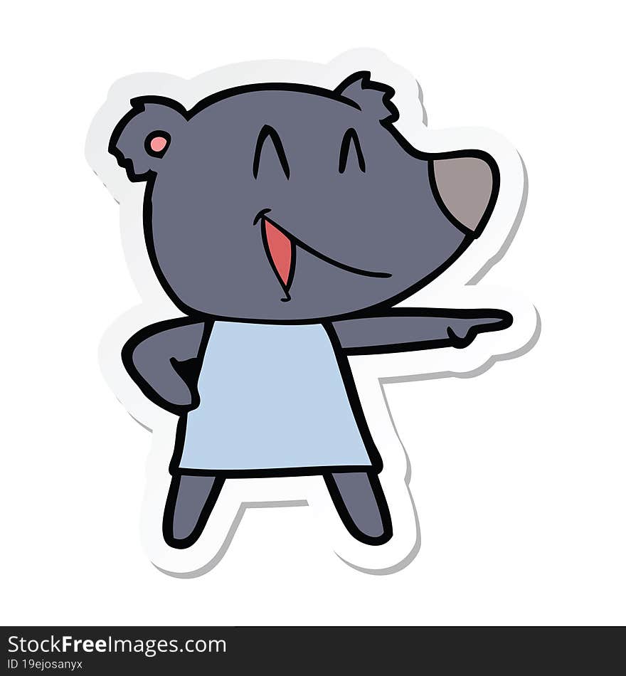 sticker of a cartoon bear in dress laughing and pointing