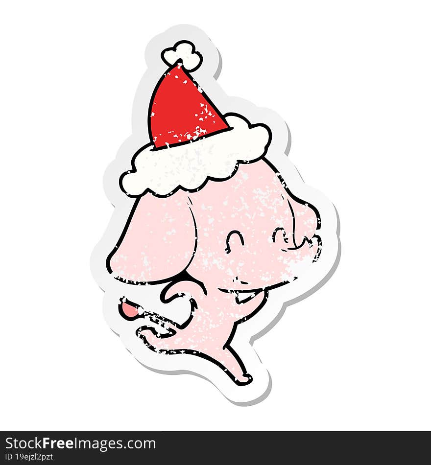 cute distressed sticker cartoon of a elephant wearing santa hat