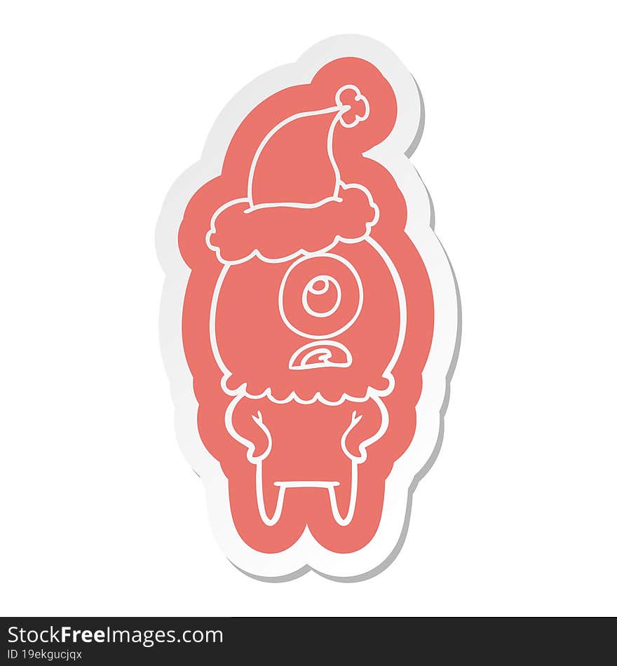 Cartoon  Sticker Of A Cyclops Alien Spaceman Wearing Santa Hat