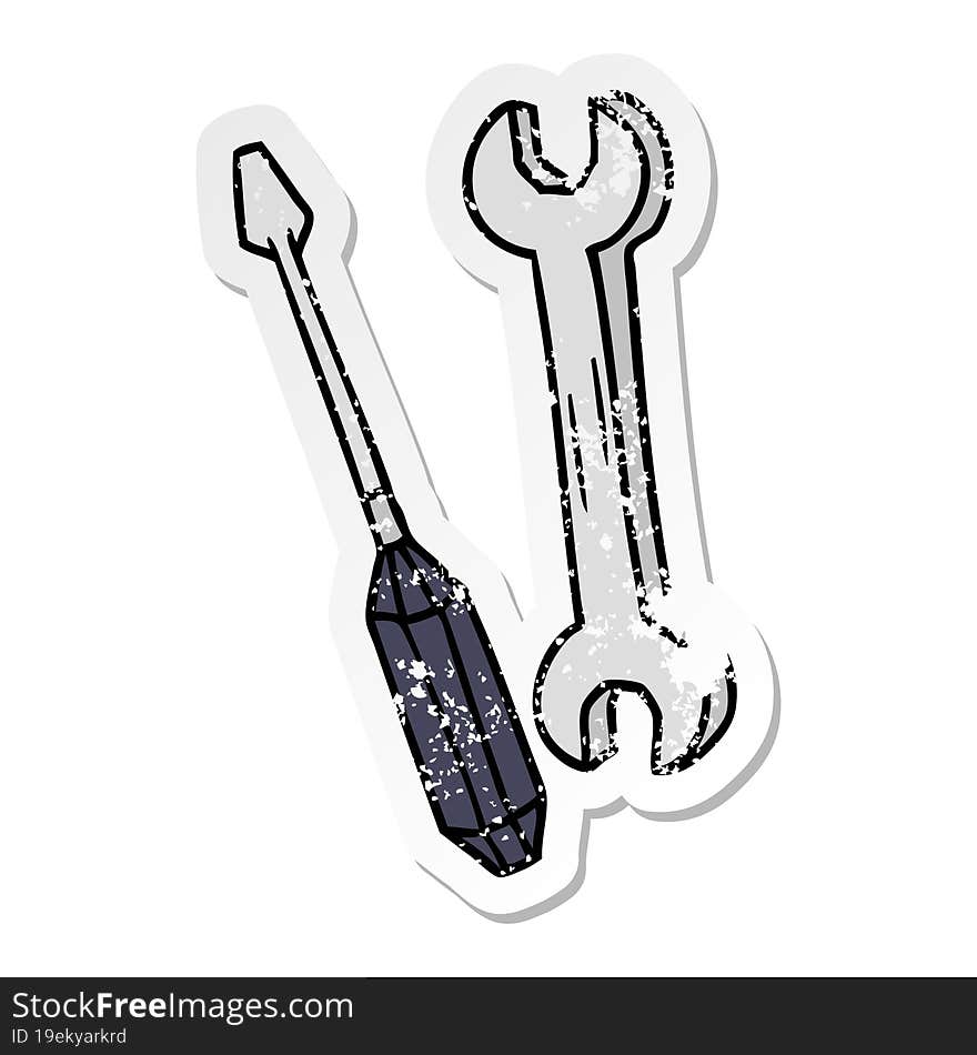 distressed sticker cartoon doodle of a spanner and a screwdriver