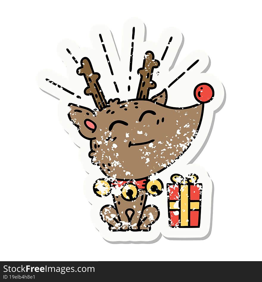 grunge sticker of tattoo style christmas reindeer with present