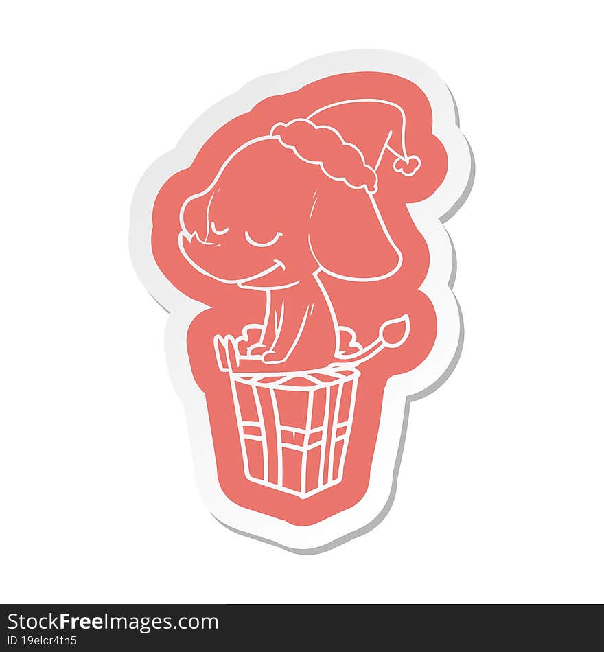 cartoon  sticker of a smiling elephant wearing santa hat