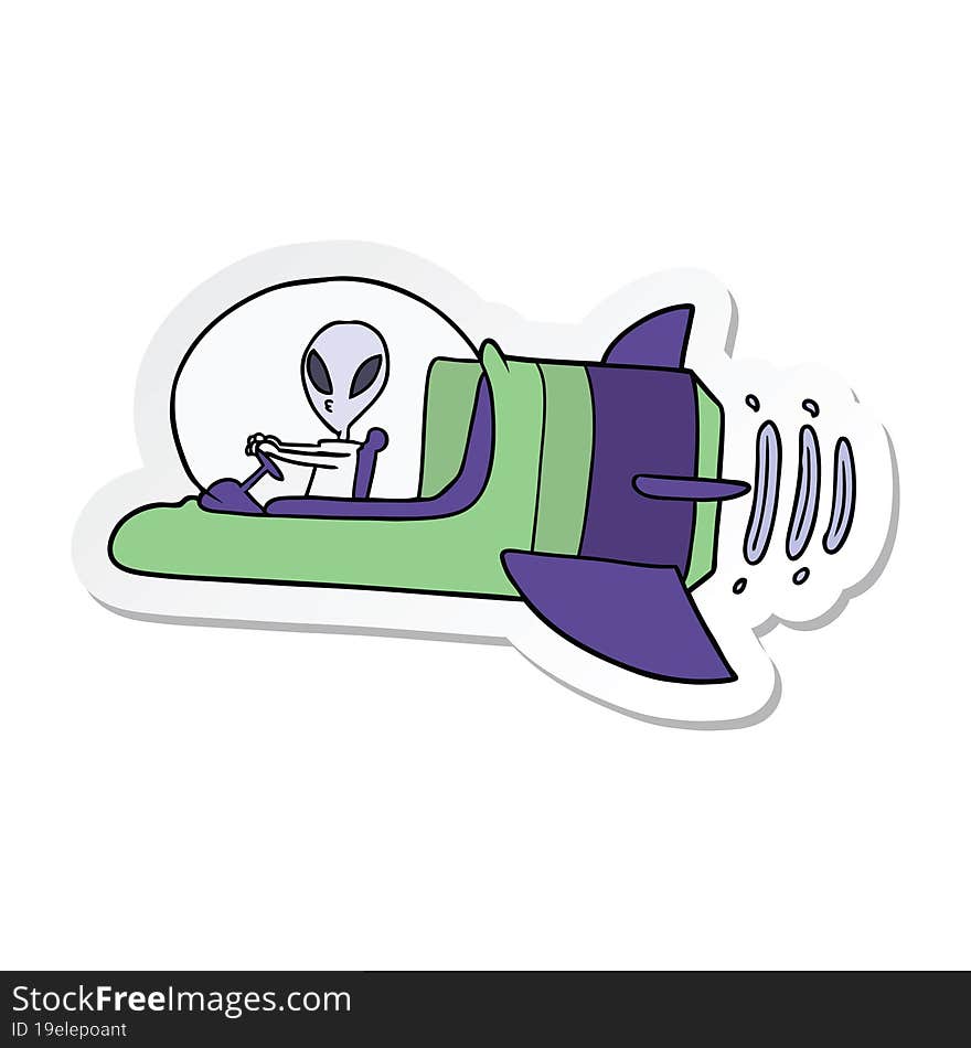 sticker of a cartoon alien spacecraft