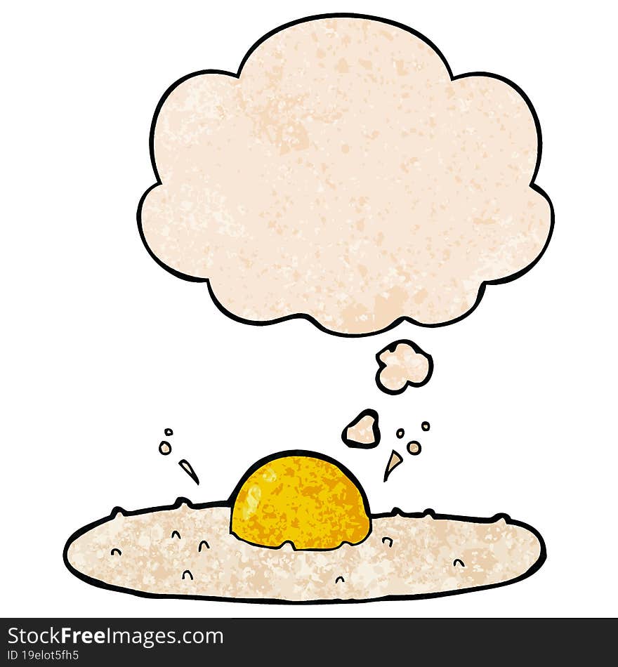 cartoon fried egg and thought bubble in grunge texture pattern style