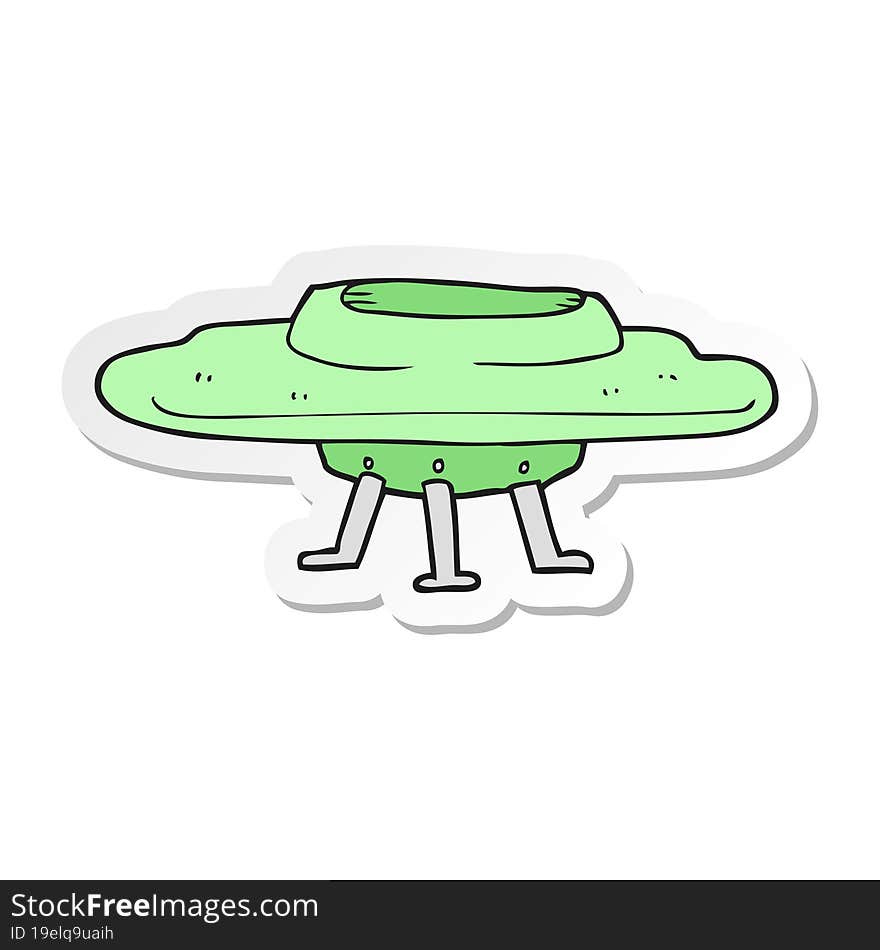 sticker of a cartoon flying saucer