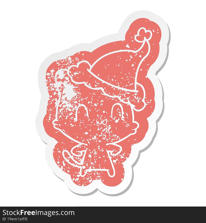 Cartoon Distressed Sticker Of A Happy Cat Wearing Santa Hat