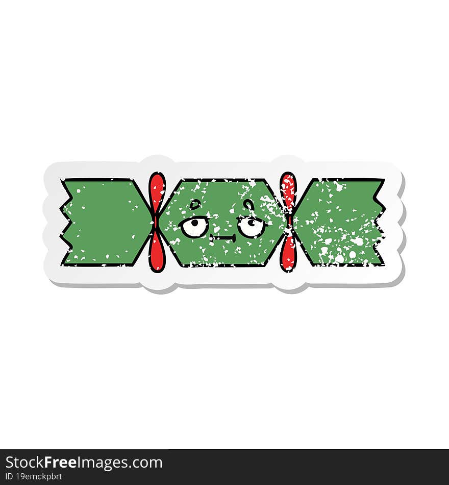 Distressed Sticker Of A Cute Cartoon Christmas Cracker