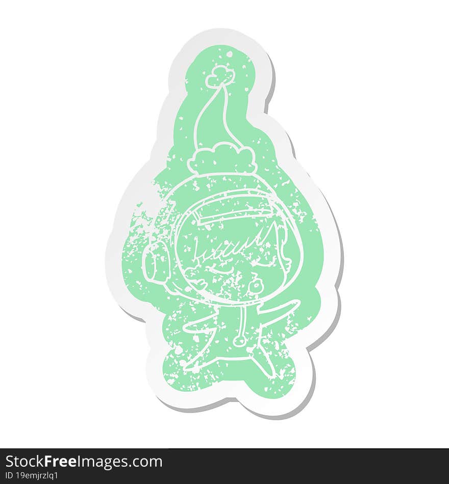 cartoon distressed sticker of a pretty astronaut girl wearing santa hat