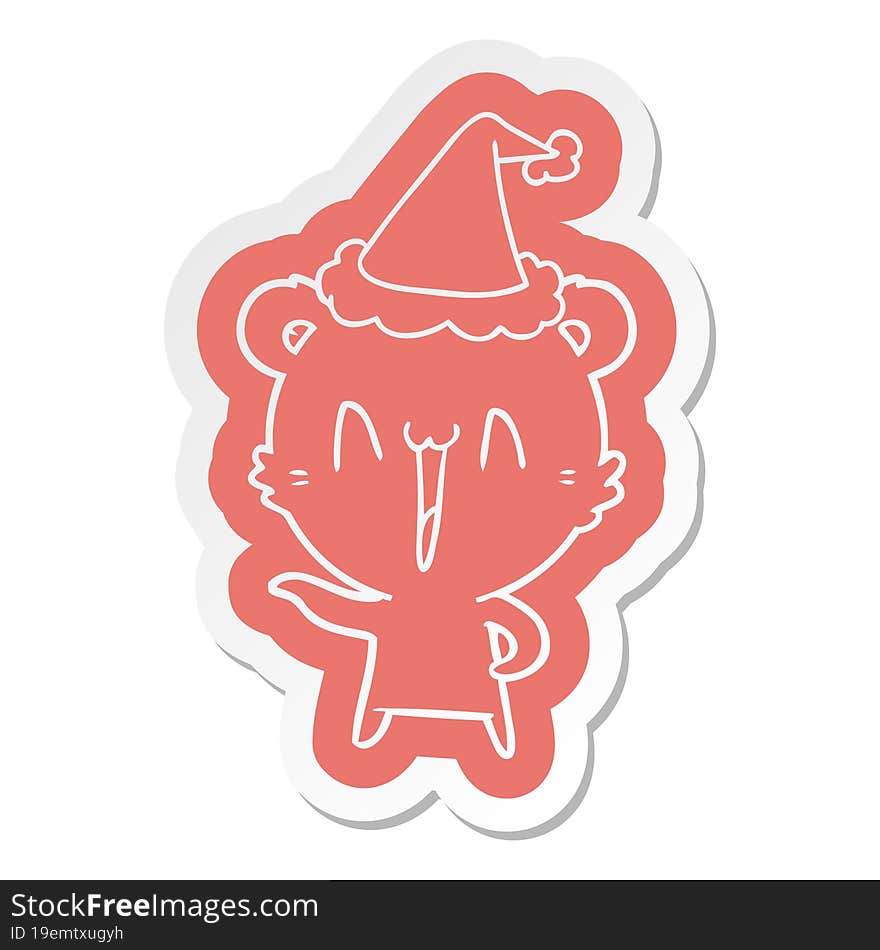 laughing polar bear cartoon  sticker of a wearing santa hat