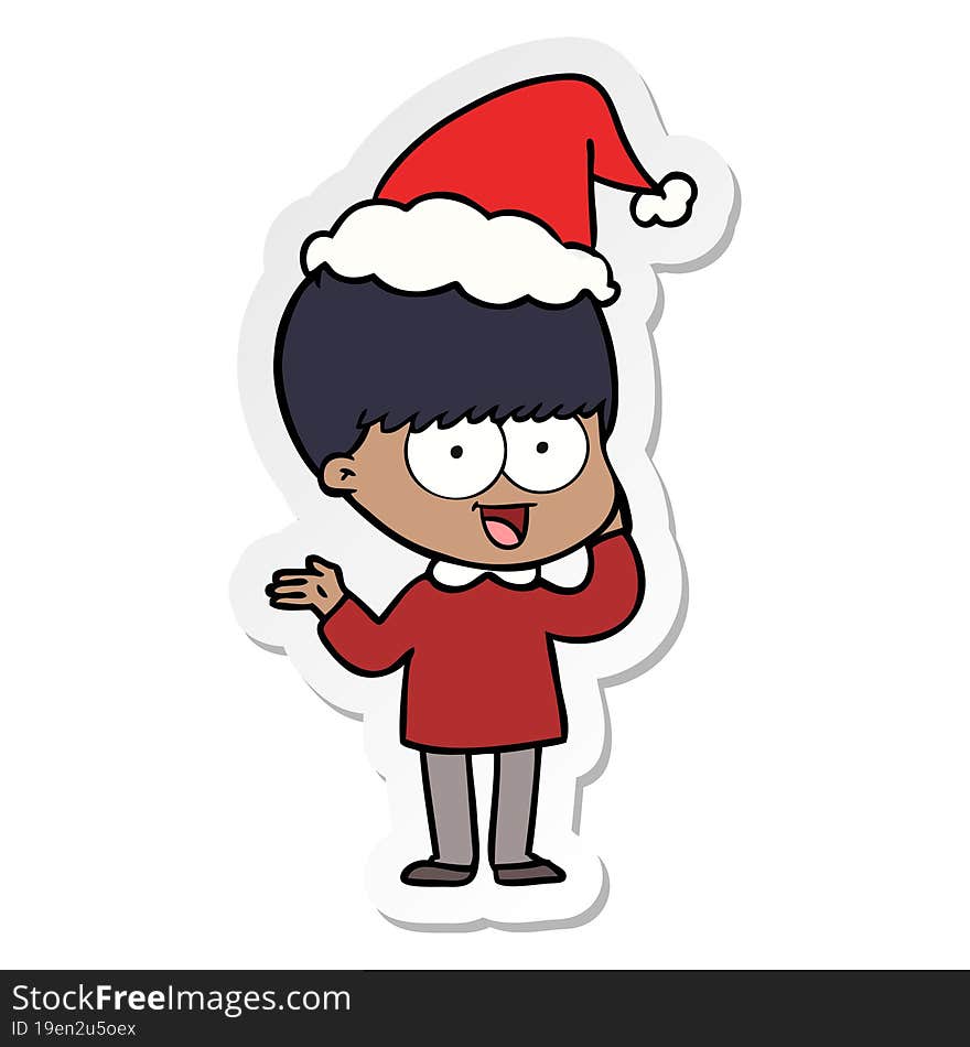 happy hand drawn sticker cartoon of a boy wearing santa hat. happy hand drawn sticker cartoon of a boy wearing santa hat