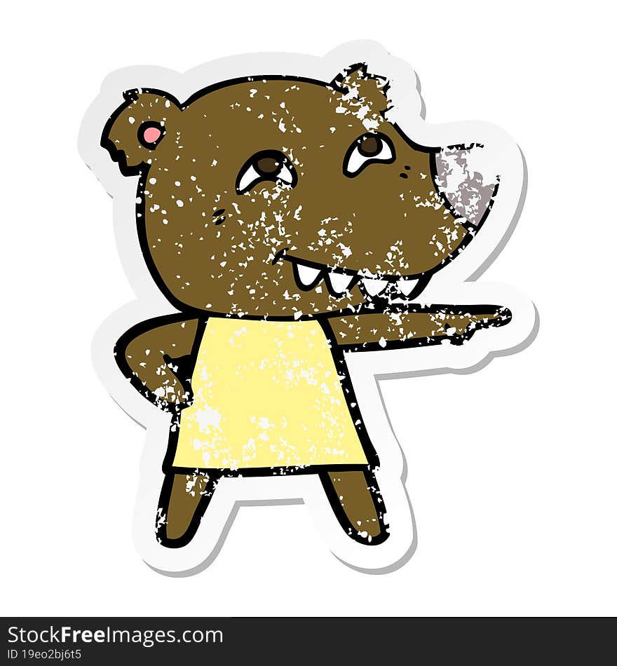 Distressed Sticker Of A Cartoon Pointing Bear Girl Showing Teeth