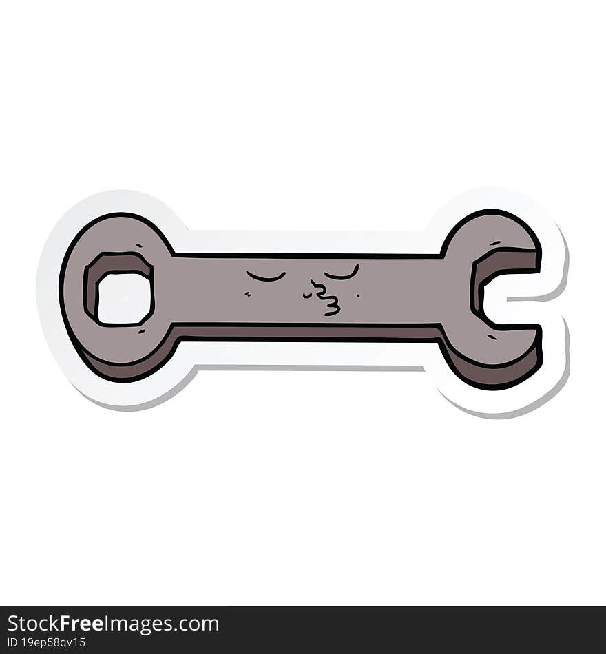 sticker of a cartoon spanner