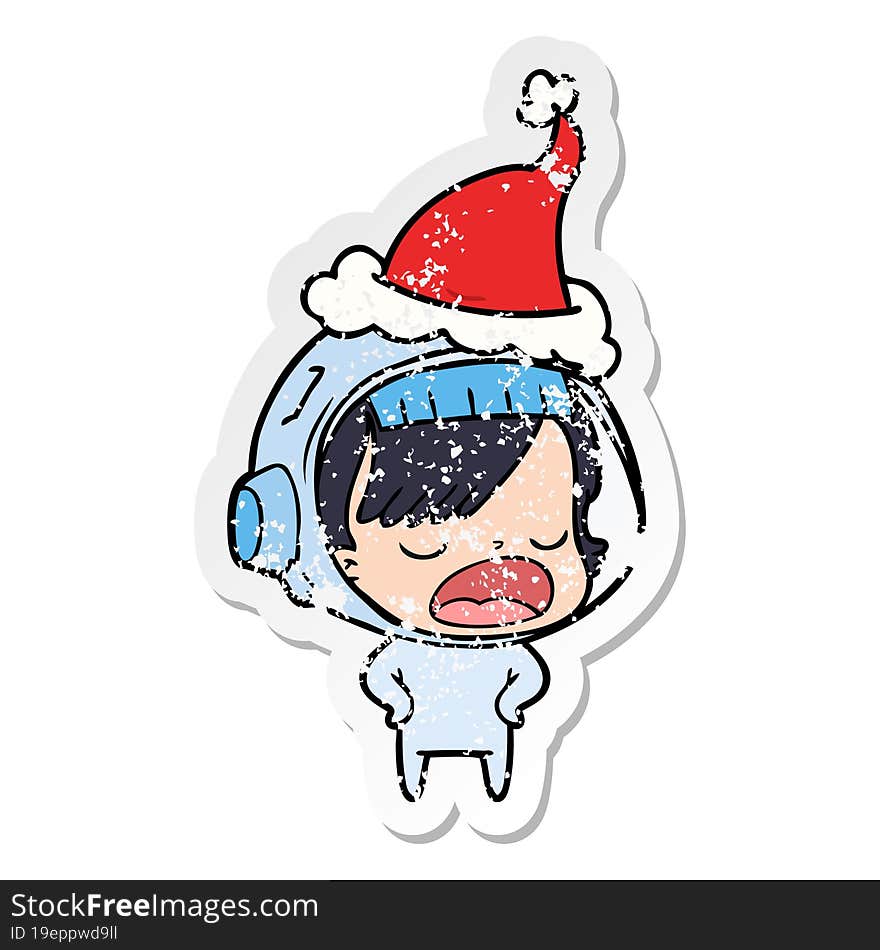 distressed sticker cartoon of a astronaut woman explaining wearing santa hat