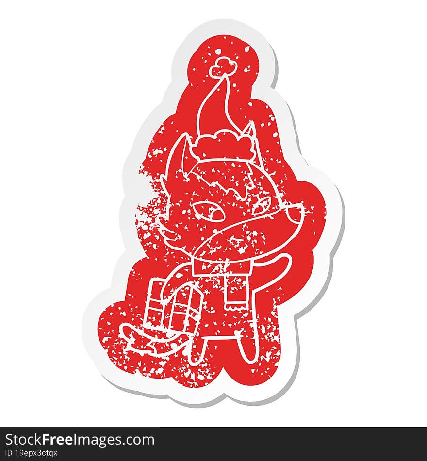 friendly cartoon distressed sticker of a christmas wolf wearing santa hat