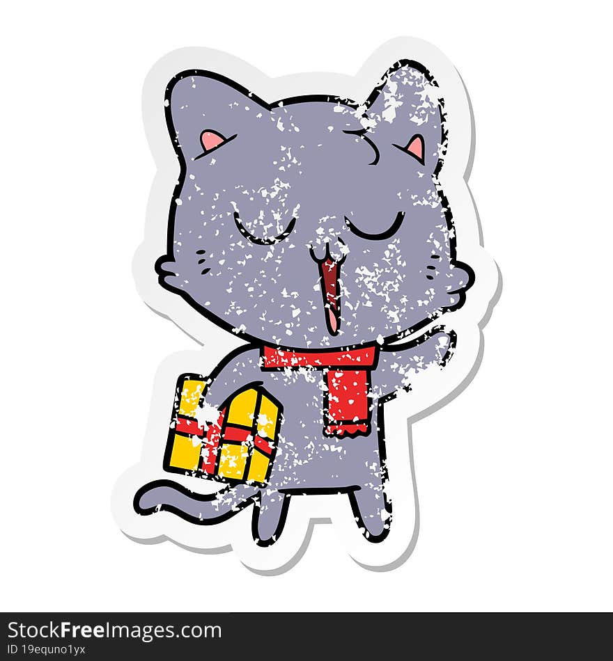 distressed sticker of a cartoon cat with gift