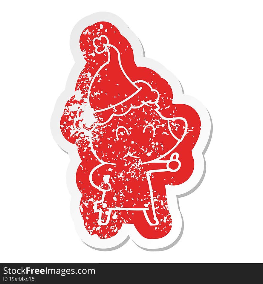 female bear cartoon distressed sticker of a wearing santa hat