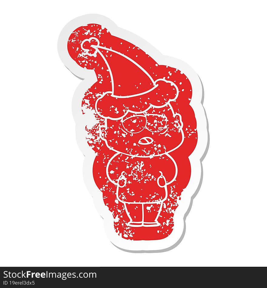 quirky cartoon distressed sticker of a tired bald man wearing santa hat