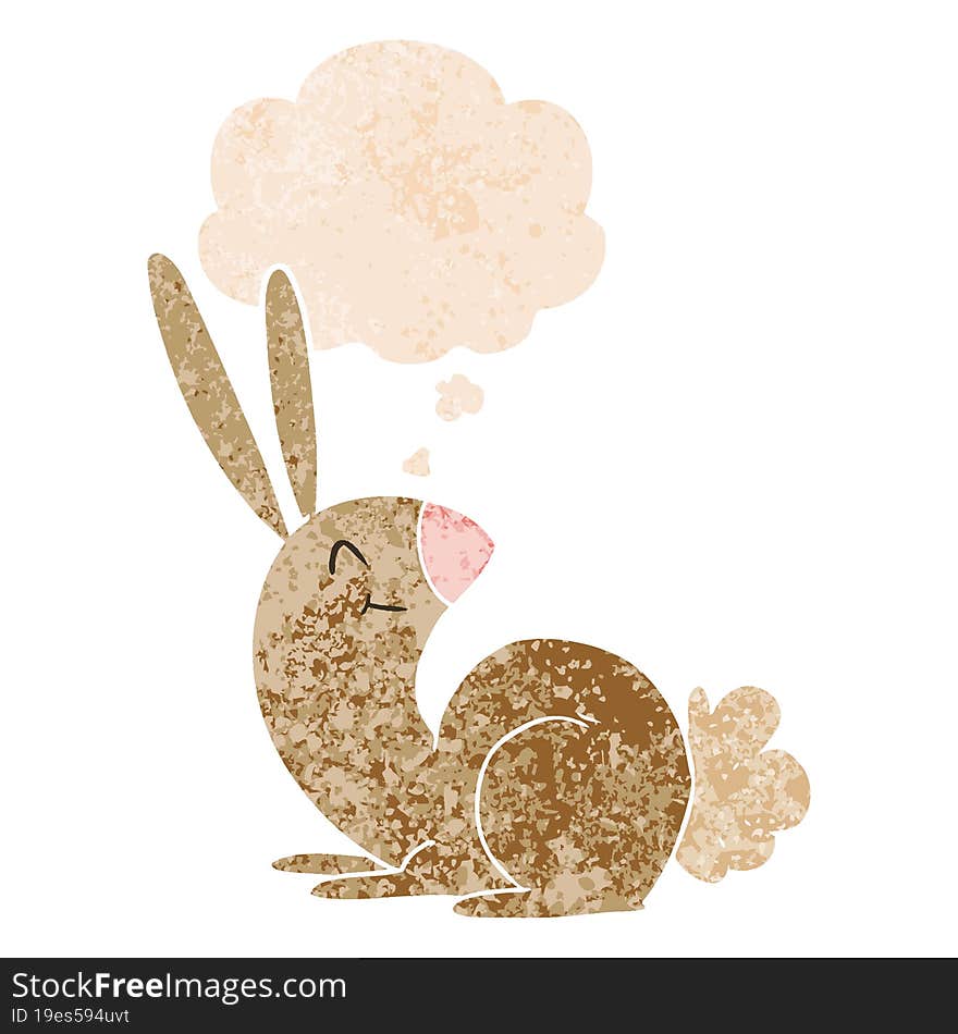 cute cartoon rabbit and thought bubble in retro textured style