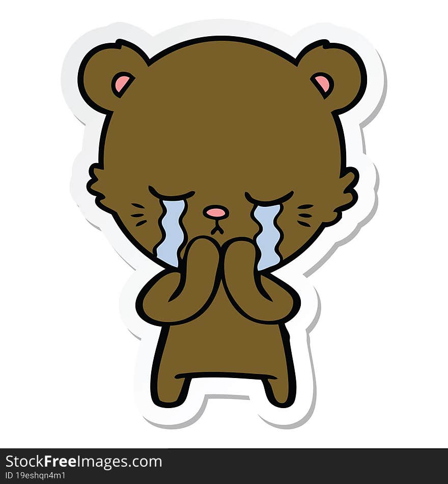 sticker of a crying cartoon bear