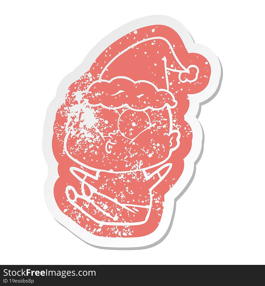 cartoon distressed sticker of a bald man staring wearing santa hat