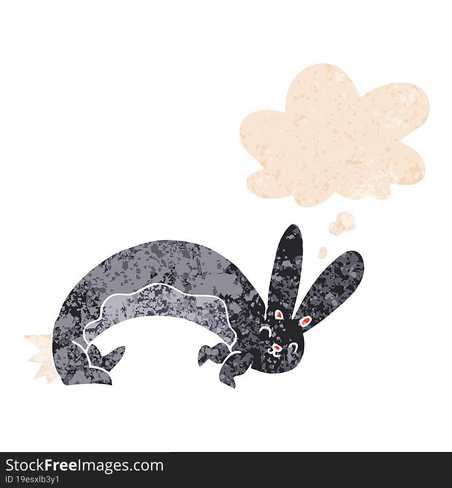 funny cartoon rabbit and thought bubble in retro textured style