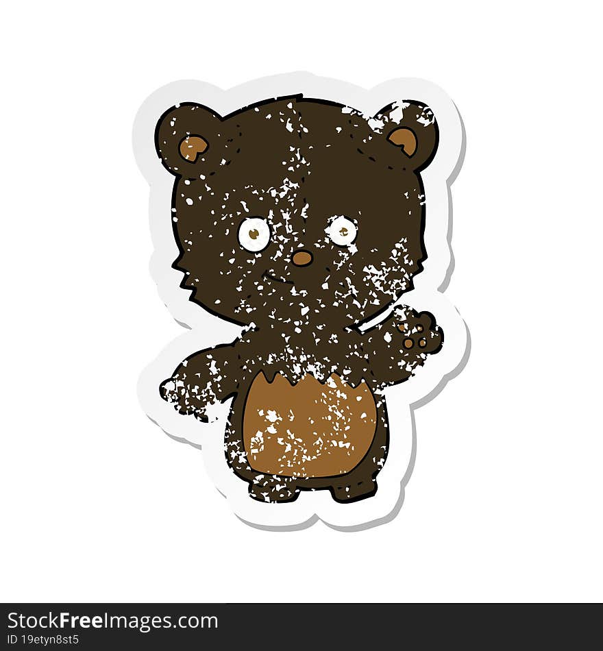 retro distressed sticker of a cartoon black bearcub waving