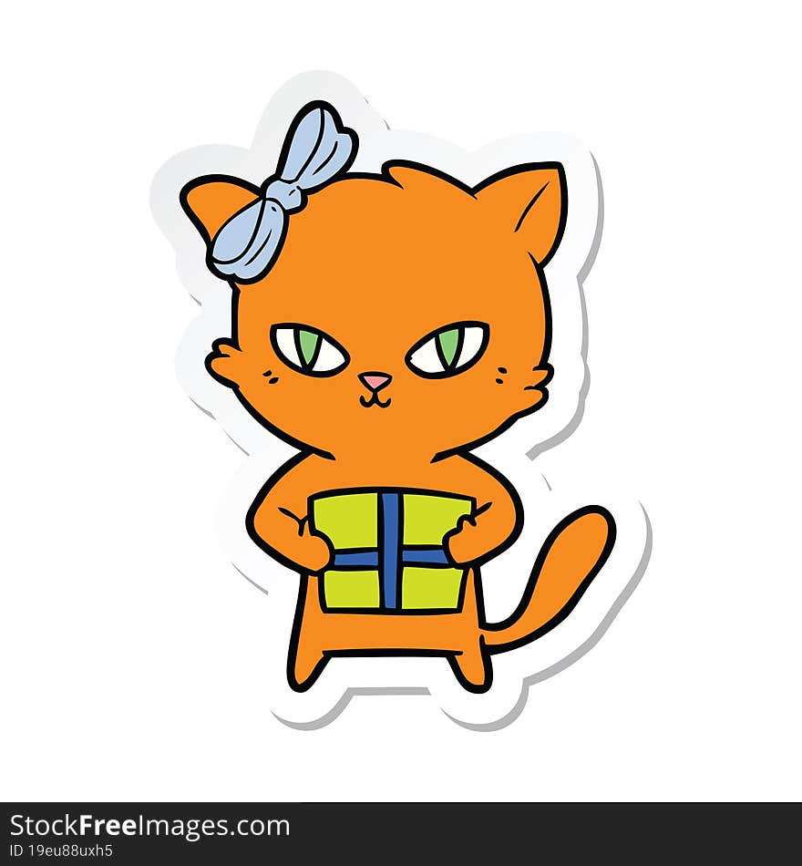 sticker of a cute cartoon cat with present