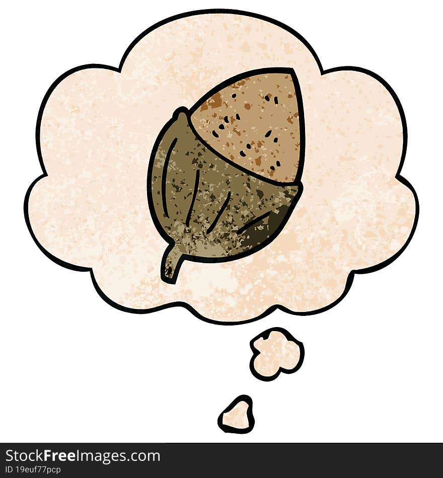 cartoon acorn and thought bubble in grunge texture pattern style