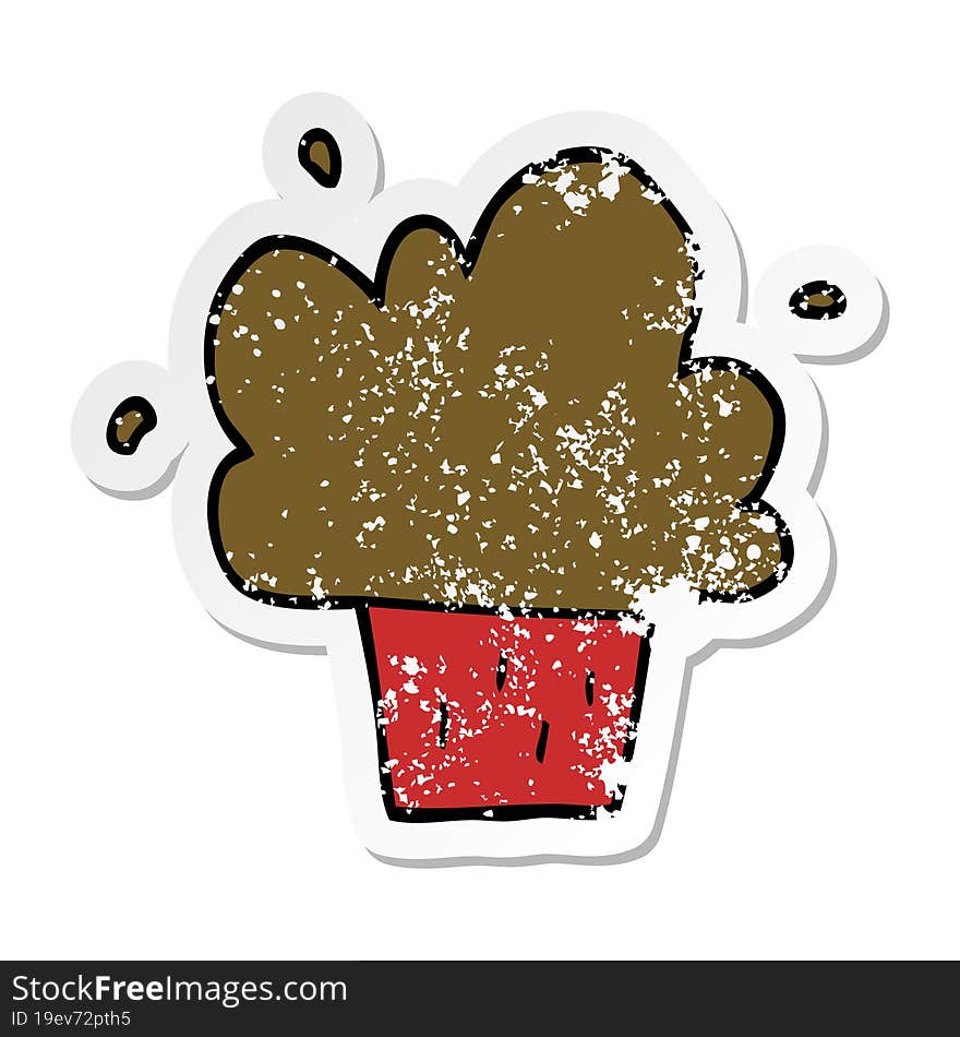 distressed sticker of a cartoon cupcake