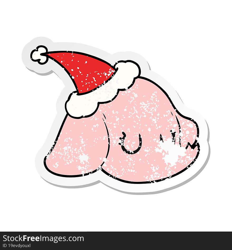 hand drawn distressed sticker cartoon of a elephant face wearing santa hat