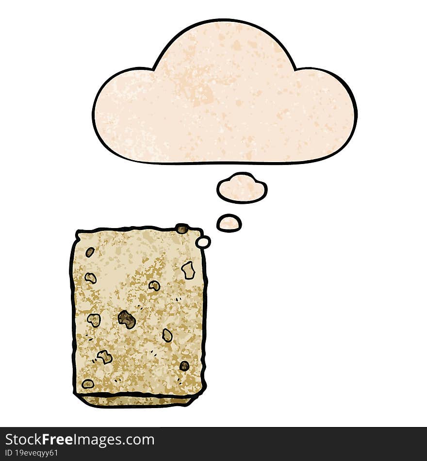 cartoon biscuit and thought bubble in grunge texture pattern style