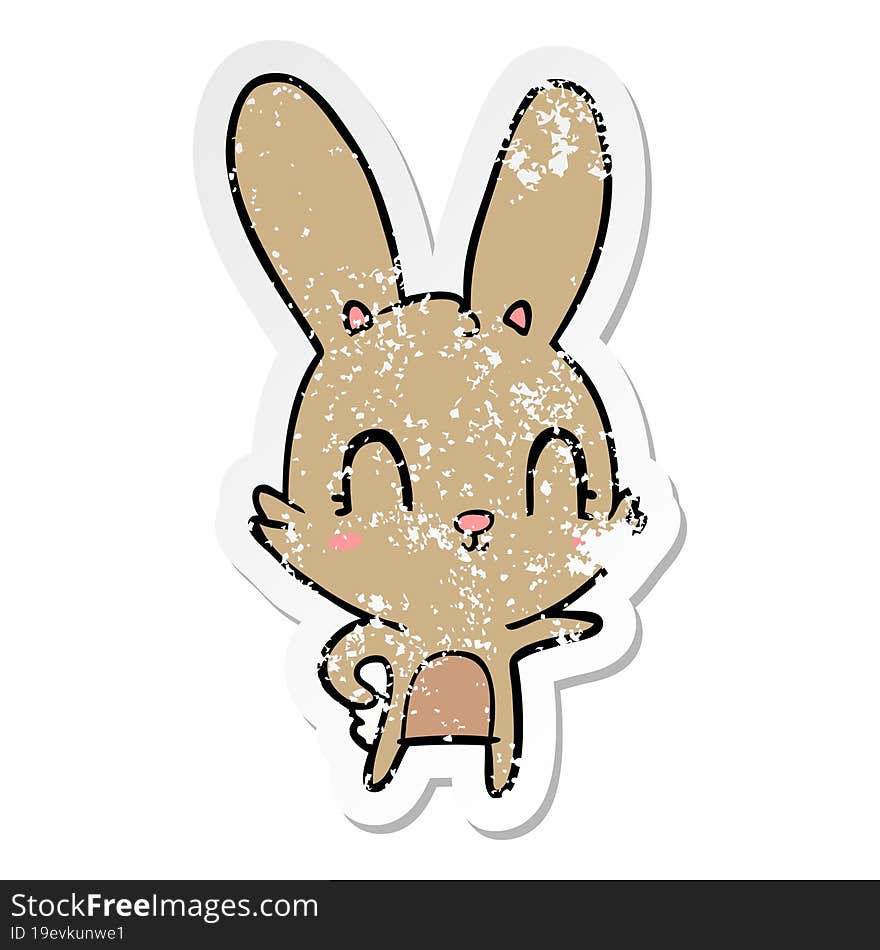 distressed sticker of a cute cartoon rabbit