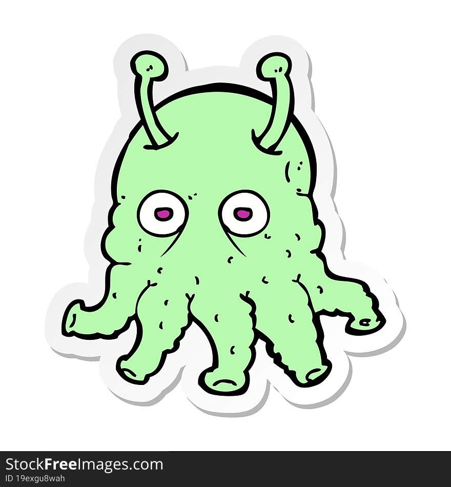 sticker of a cartoon space alien