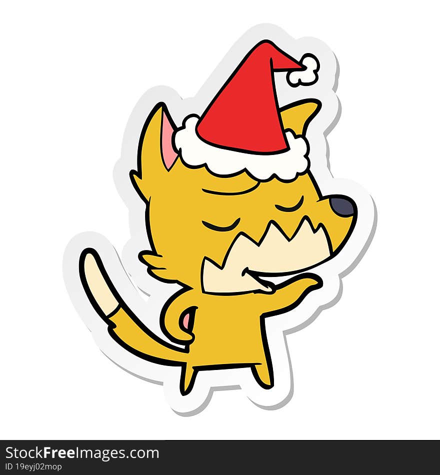 friendly hand drawn sticker cartoon of a fox wearing santa hat. friendly hand drawn sticker cartoon of a fox wearing santa hat