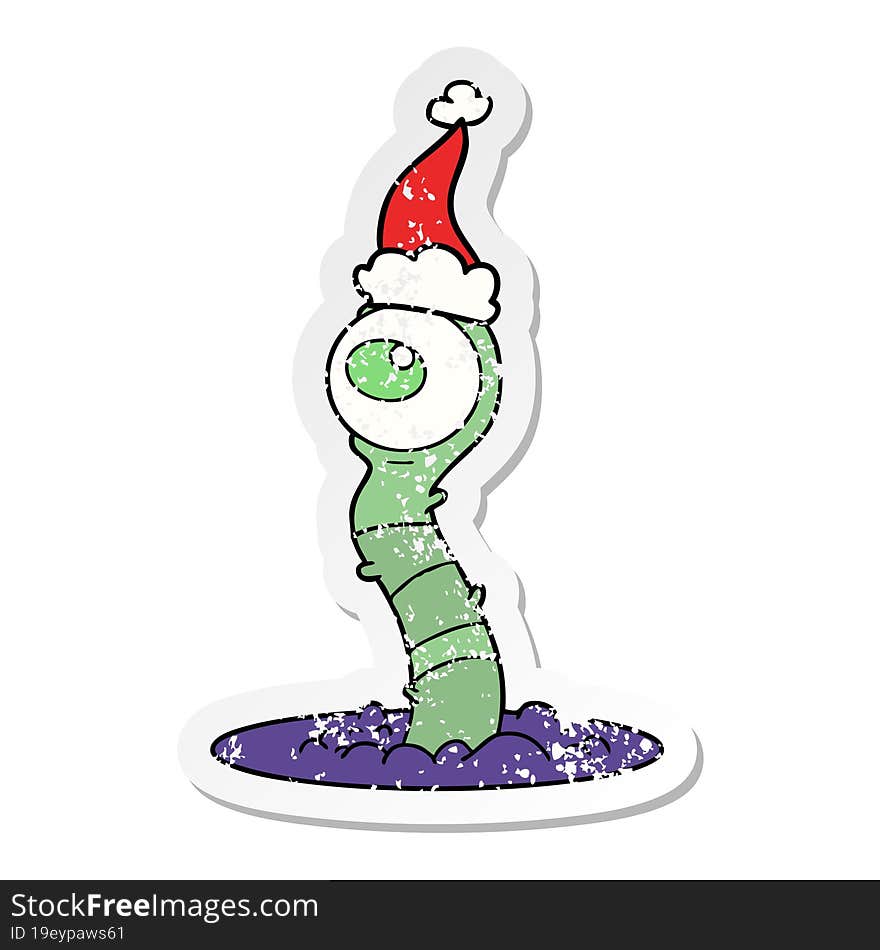 Distressed Sticker Cartoon Of A Alien Swamp Monster Wearing Santa Hat