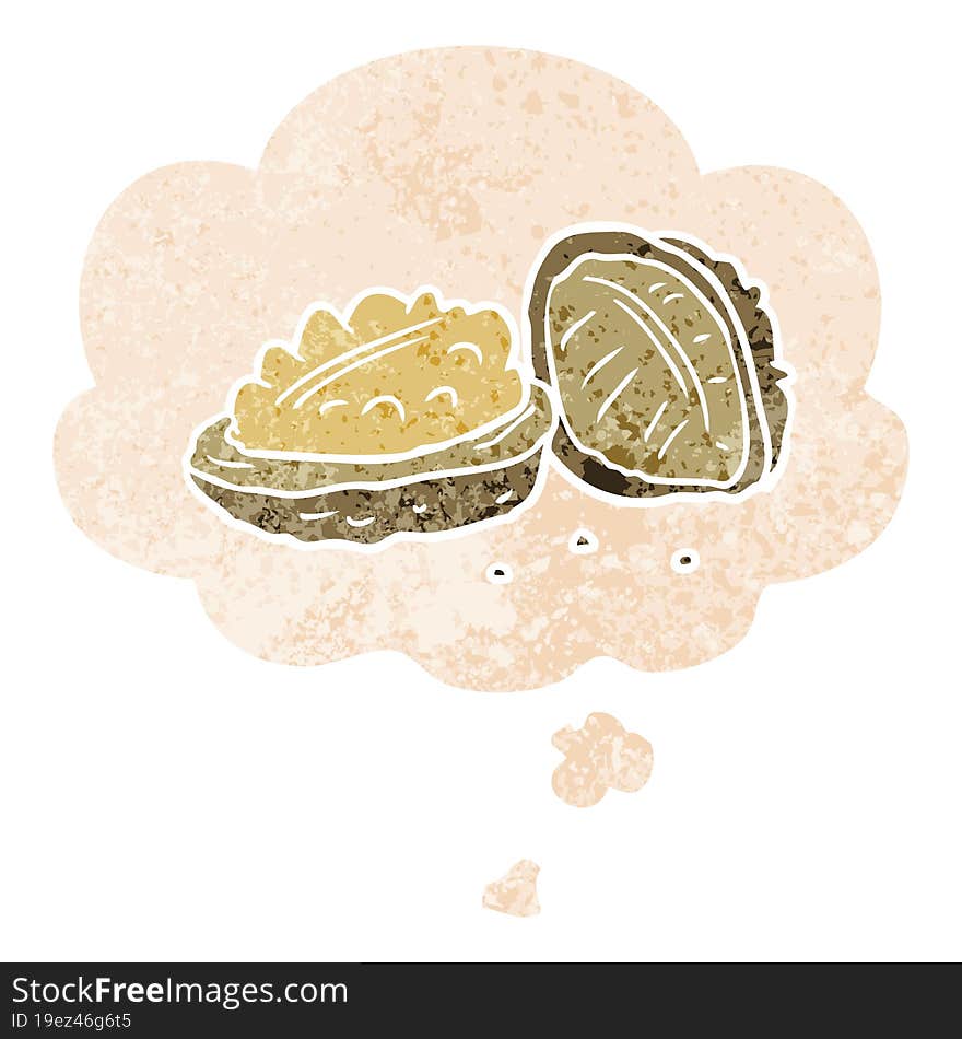 cartoon walnuts and thought bubble in retro textured style