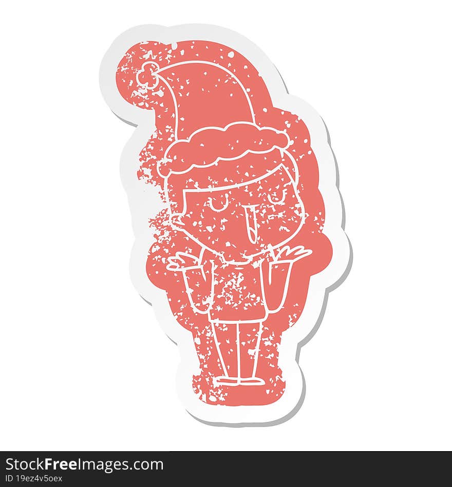 cartoon distressed sticker of a happy boy with no worries wearing santa hat