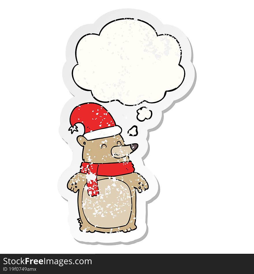 cartoon christmas bear and thought bubble as a distressed worn sticker