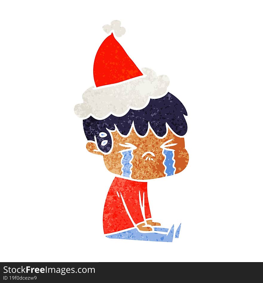 retro cartoon of a boy crying wearing santa hat