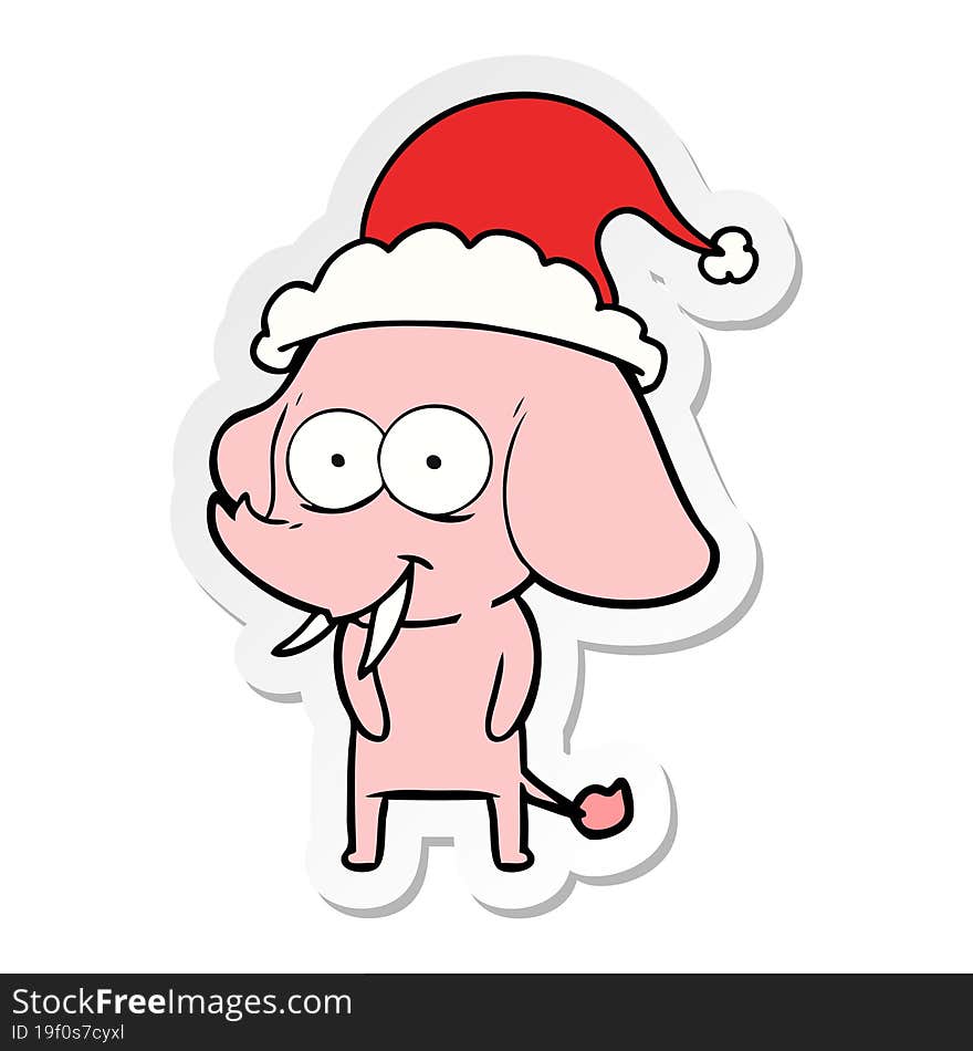 happy hand drawn sticker cartoon of a elephant wearing santa hat. happy hand drawn sticker cartoon of a elephant wearing santa hat