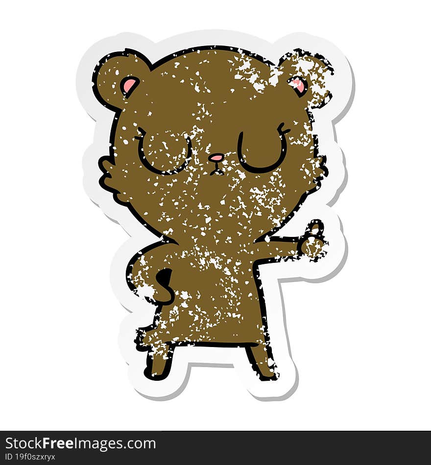 distressed sticker of a peaceful cartoon bear cub