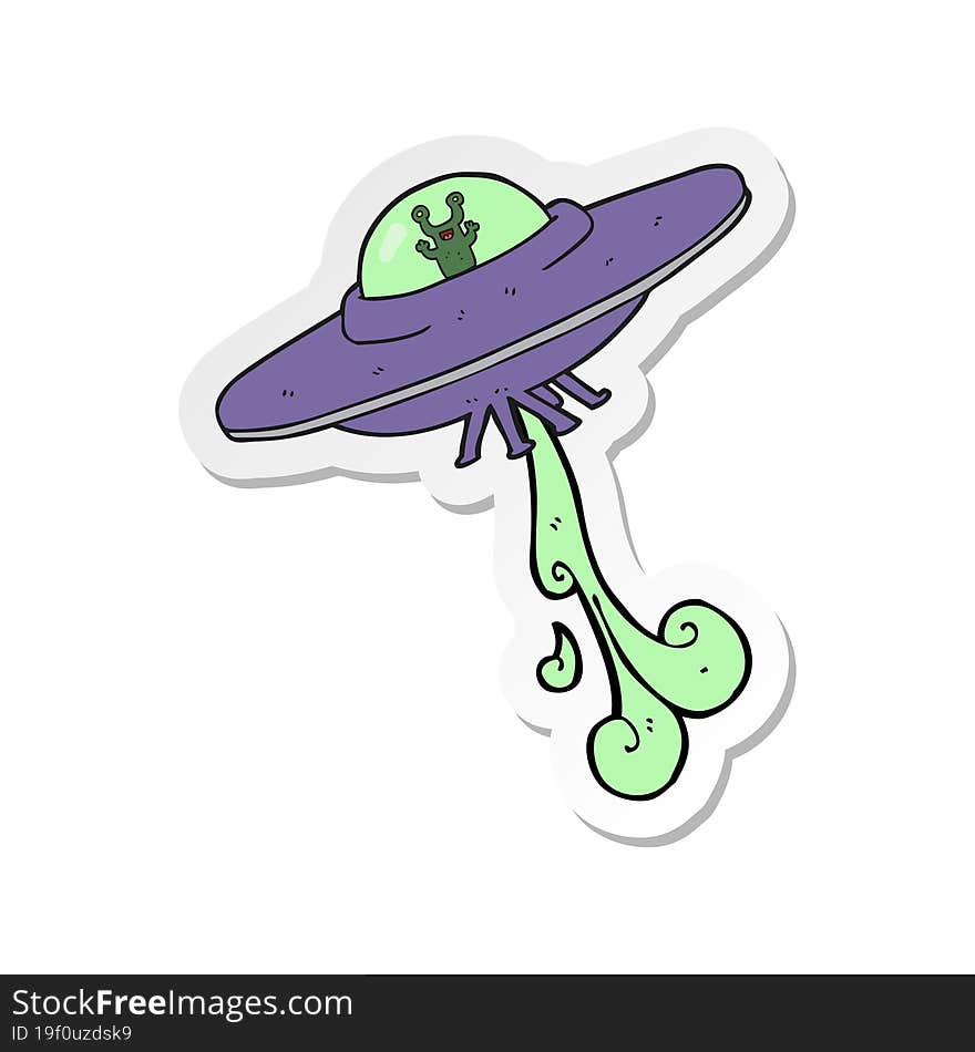 sticker of a cartoon alien spaceship