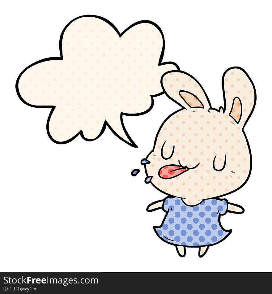 cute cartoon rabbit blowing raspberry and speech bubble in comic book style