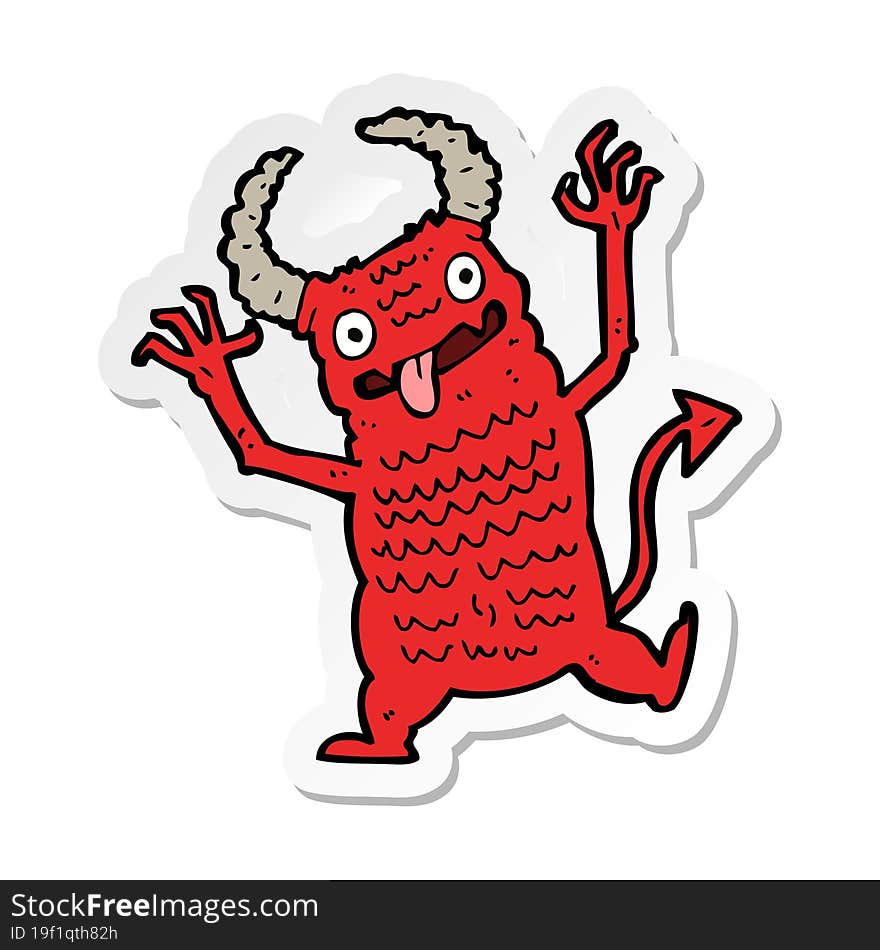 sticker of a cartoon demon