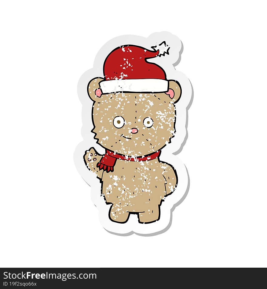 retro distressed sticker of a cartoon christmas teddy bear