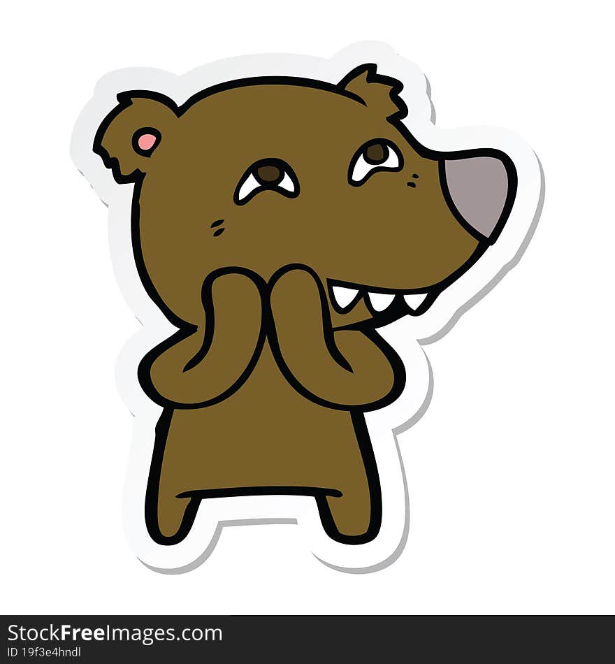 sticker of a cartoon bear showing teeth