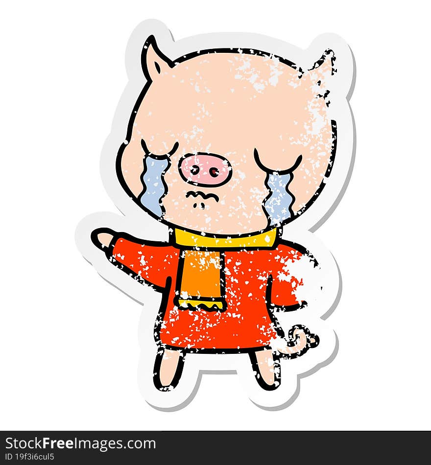 distressed sticker of a cartoon crying pig wearing scarf