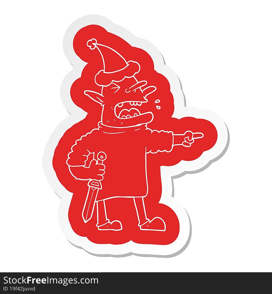 cartoon  sticker of a goblin with knife wearing santa hat