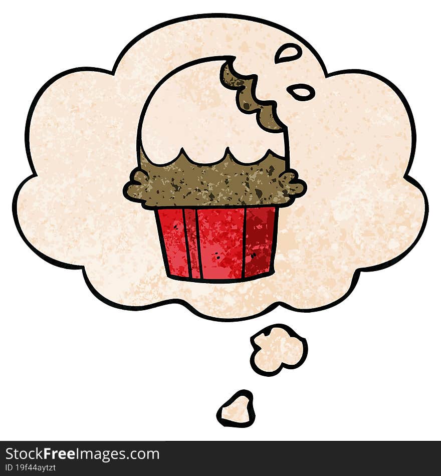 cartoon cupcake with thought bubble in grunge texture style. cartoon cupcake with thought bubble in grunge texture style